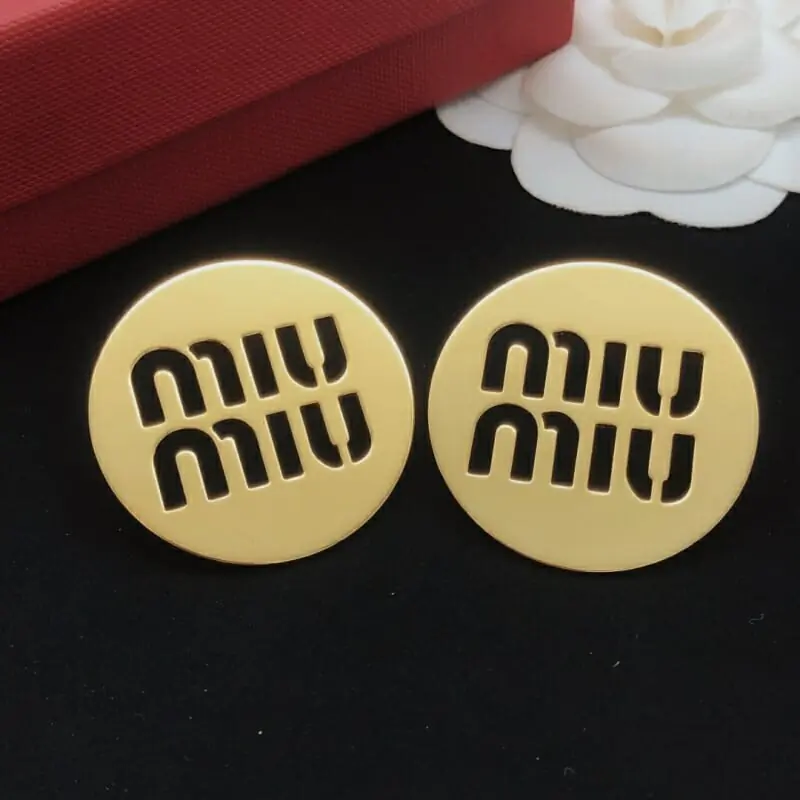 miu miu boucles doreilles pour femme s_12631564